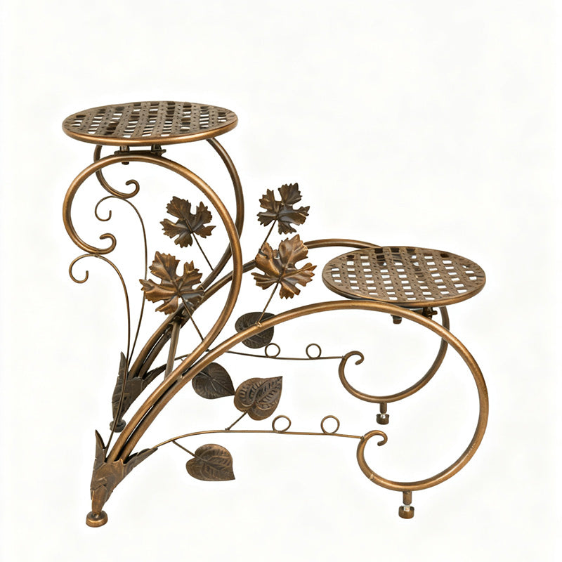 FLORON Antique Copper-Finish Wrought Iron Two-Tier Flower Stand, featuring intricate vine, leaf, and scrollwork design. Includes two circular mesh planter platforms, shown on a white background.