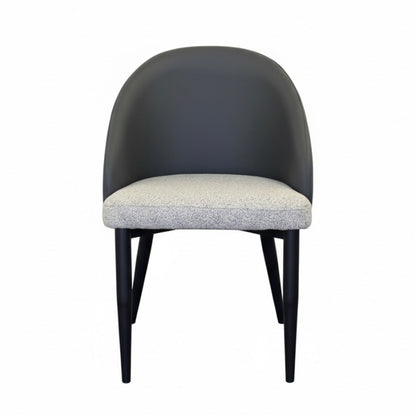 Front view of the NOTI Chair, black metal legs, dark gray leather backrest, light gray fabric seat.