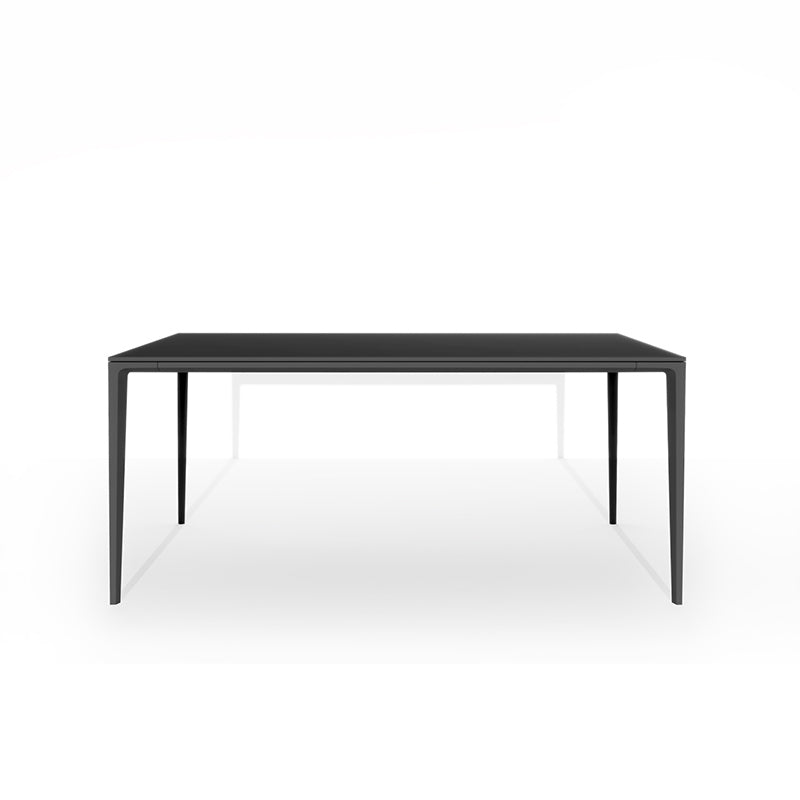 Front perspective studio shot of the RAG Contemporary Sintered Stone Dining Table. The table has a black top and black aluminum legs, isolated on a white background. Dimensions: 180CM x 90CM (71in x 35.5in).