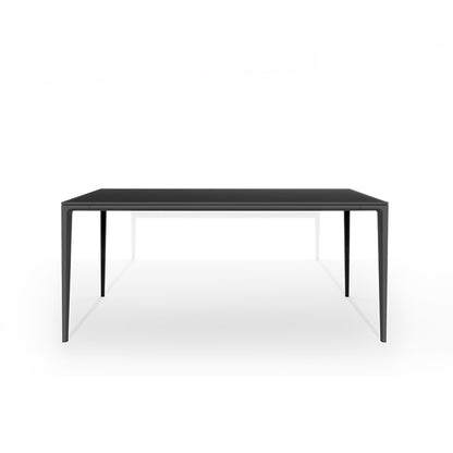 Front perspective studio shot of the RAG Contemporary Sintered Stone Dining Table. The table has a black top and black aluminum legs, isolated on a white background. Dimensions: 180CM x 90CM (71in x 35.5in).