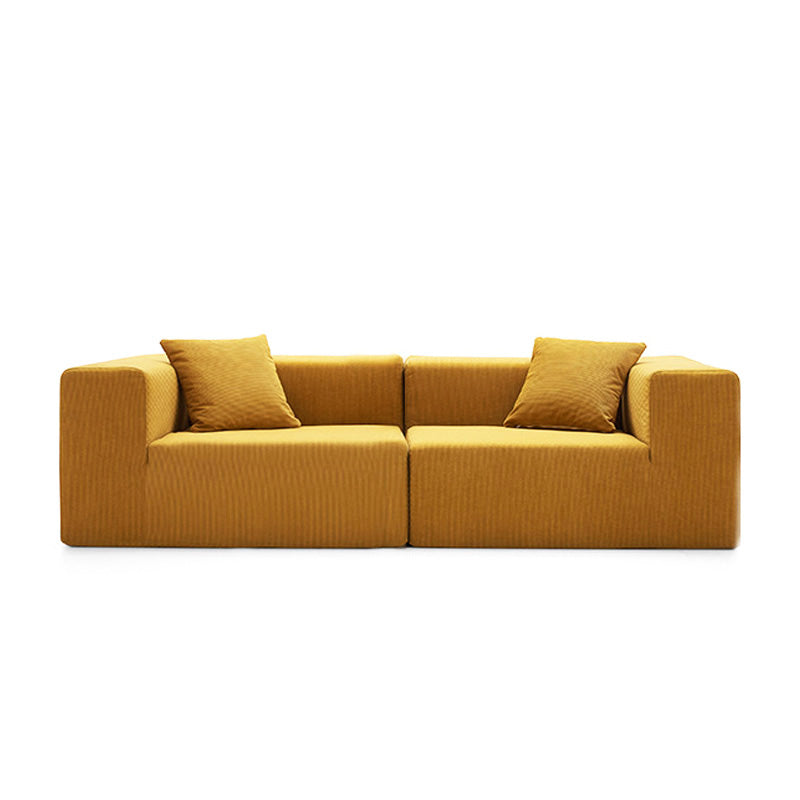 Front view of TOFU 2.2m sectional sofa in yellow fine-textured fabric highlighting its sleek minimalist silhouette.