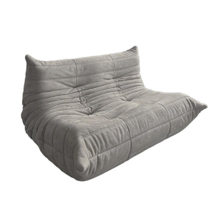 Side view of an Togo-style two- seater in grey fabric.