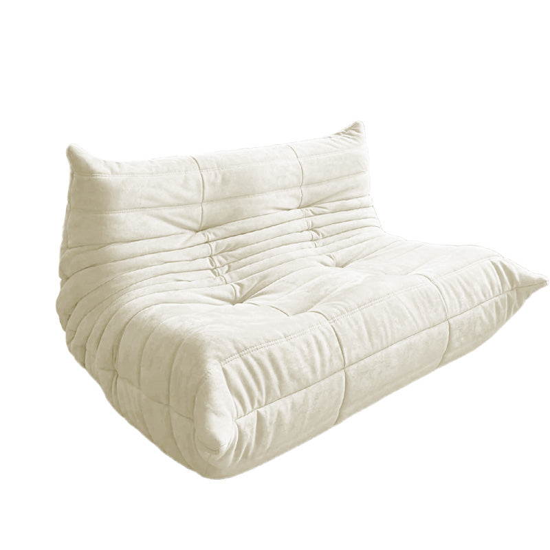 Side view of an Togo-style two- seater in off-white fabric.