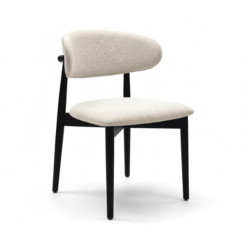 CROIST modern minimalist dining chair with round black wood back and off-white fabric upholstery.