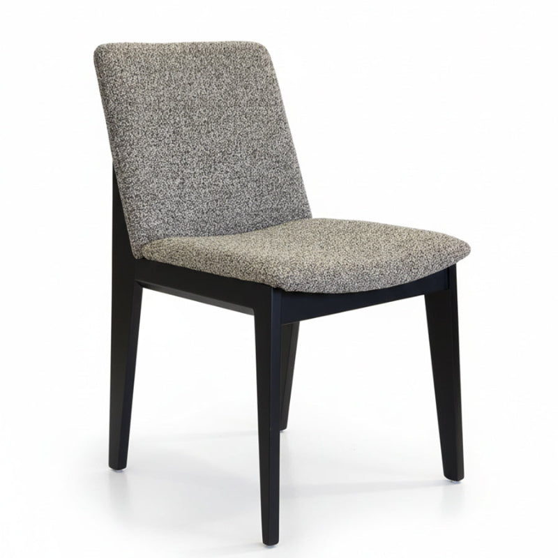 FOD modern dining chair side view with solid black wood legs and grey fabric upholstery.
