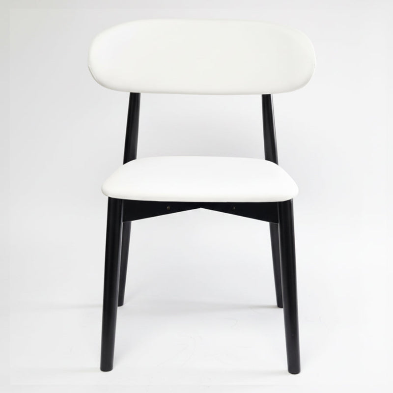 KROSNT modern minimalist dining chair with round black wood back and white faux leather seat on a clean white background,front view.