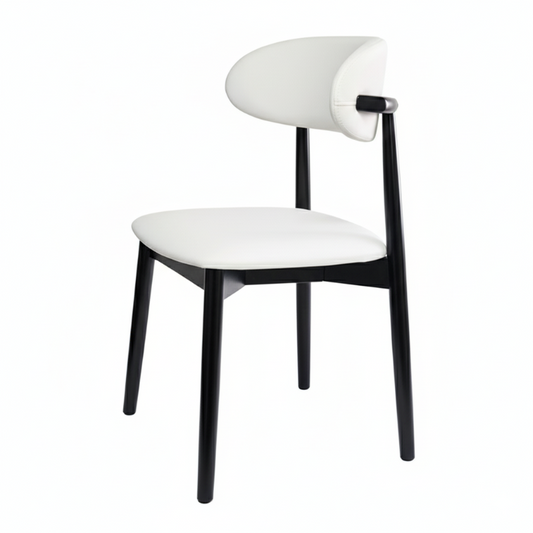 KROSNT sculptural chair side view, showing tapered black legs and curved white upholstered seat on the white background.