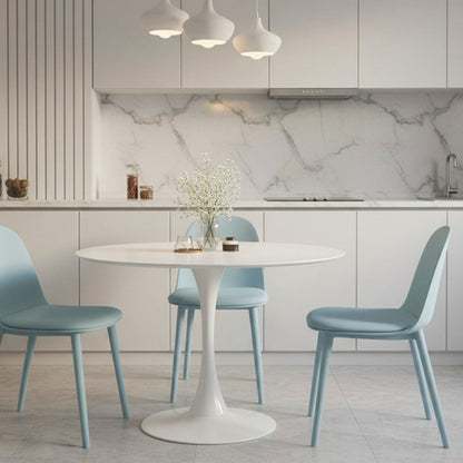 TLIP Round White Sintered Stone Dining Table with Blue MACARON Chairs – Modern Dining Room Scene, Bright and Stylish Décor