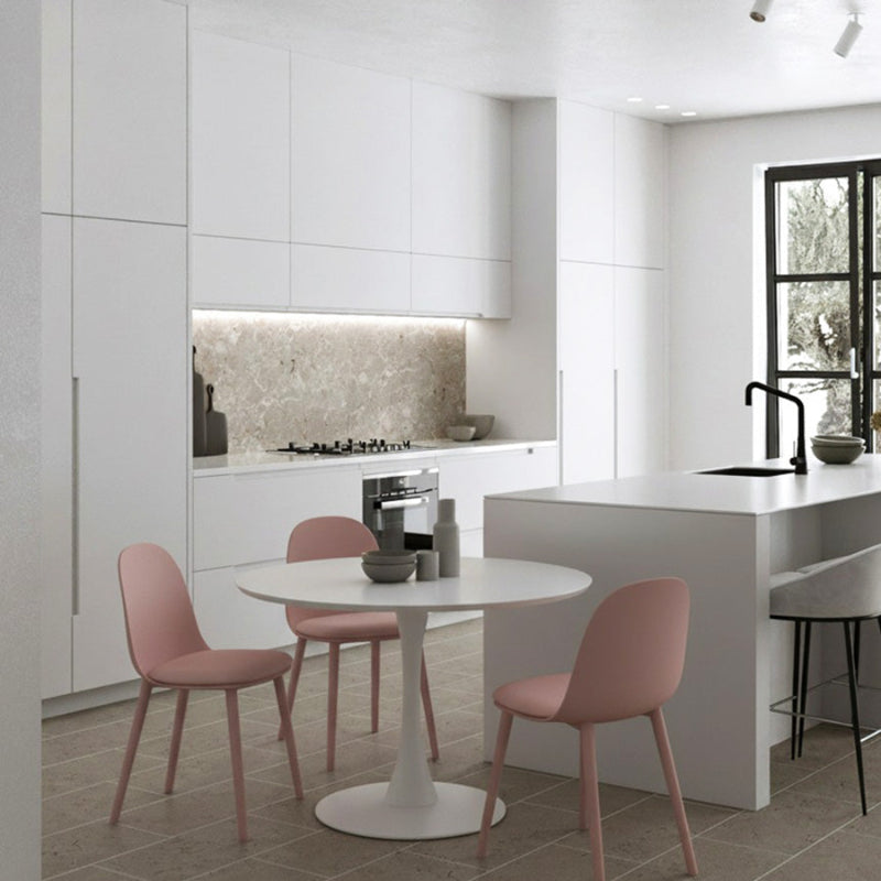 TLIP Round White Sintered Stone Dining Table with Macaron Pink Chairs – Bright and Playful Modern Dining Setup