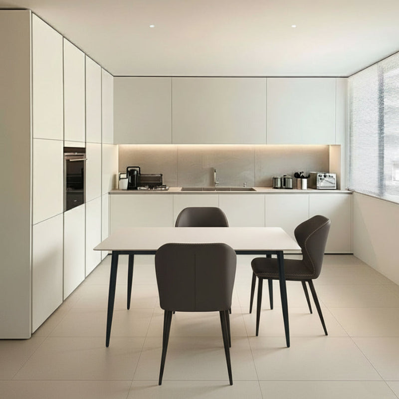 BF dining chair in uniform dark grey faux leather, shown in a modern kitchen and dining room setting to illustrate home compatibility.