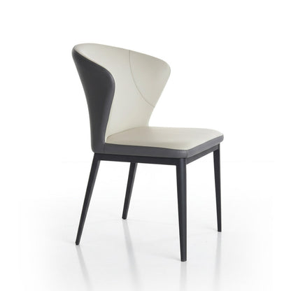 Perspective side angle of CORNO beige and grey chair showing wrap-around back design