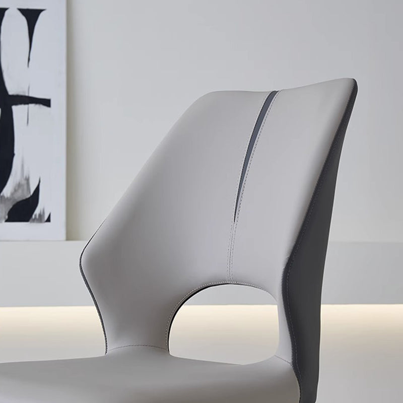 Close-up of MYRIN dining chair ergonomic backrest and cut-out design