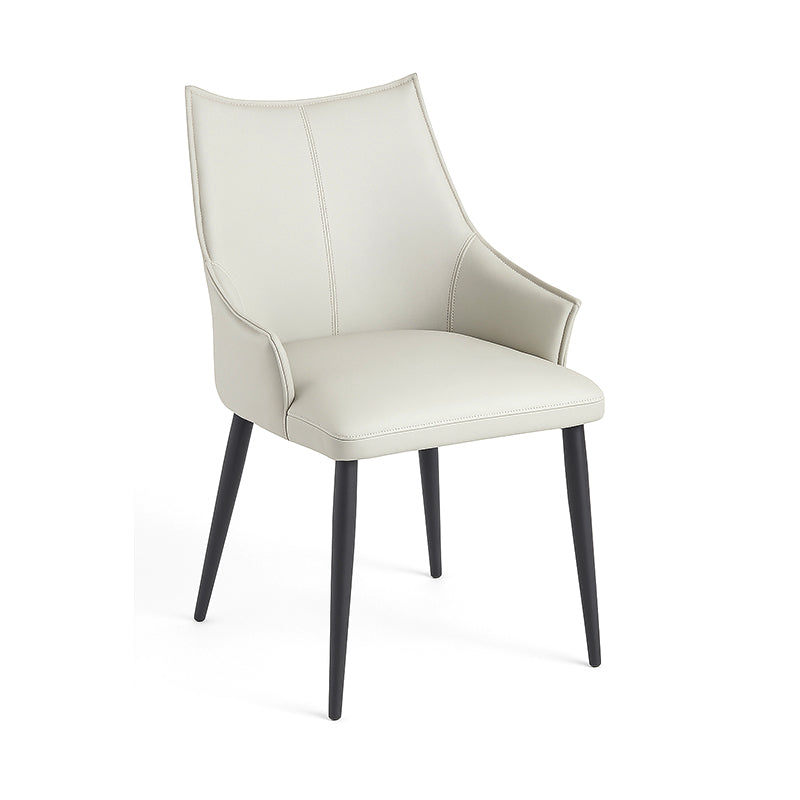 45-degree front perspective of SORREN Dining Chair in beige faux leather