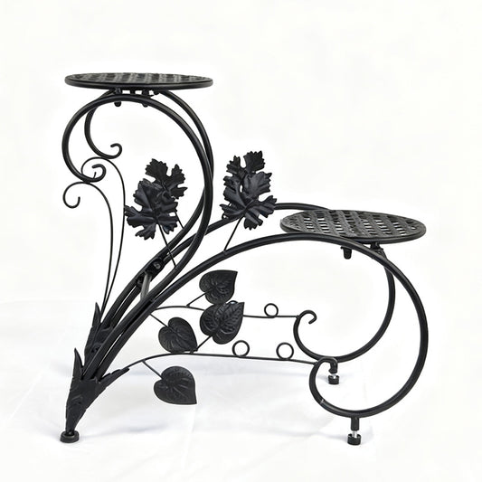 FLORON Black Wrought Iron Two-Tier Flower Stand, featuring intricate vine, leaf, and scrollwork design. Includes two circular mesh planter platforms, front view on a white background.