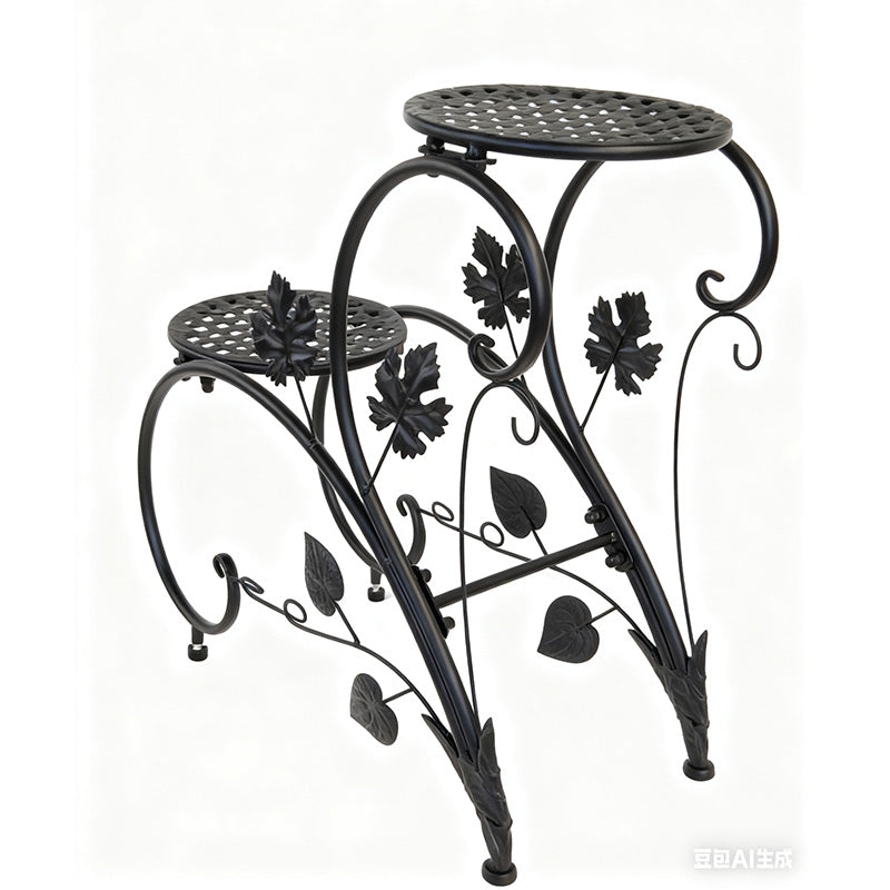 FLORON Black Wrought Iron Two-Tier Flower Stand, featuring intricate vine, leaf, and scrollwork design. Includes two circular mesh planter platforms, on a white background.
