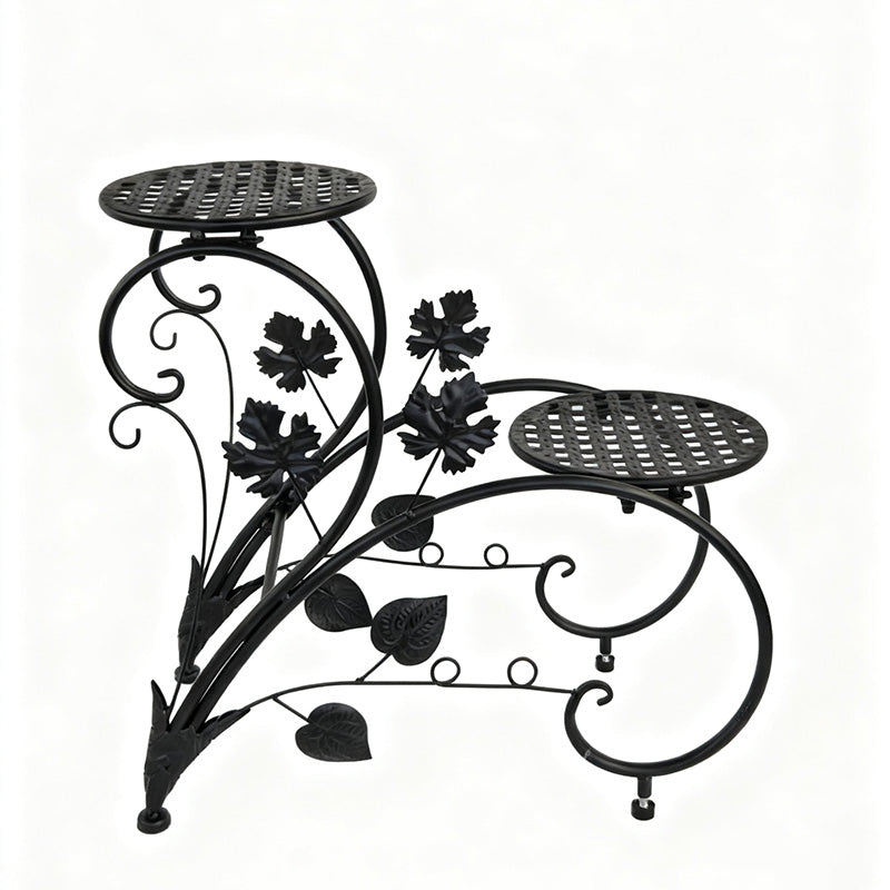 FLORON Black Wrought Iron Two-Tier Flower Stand, featuring intricate vine, leaf, and scrollwork design. Includes two circular mesh planter platforms, on a white background.