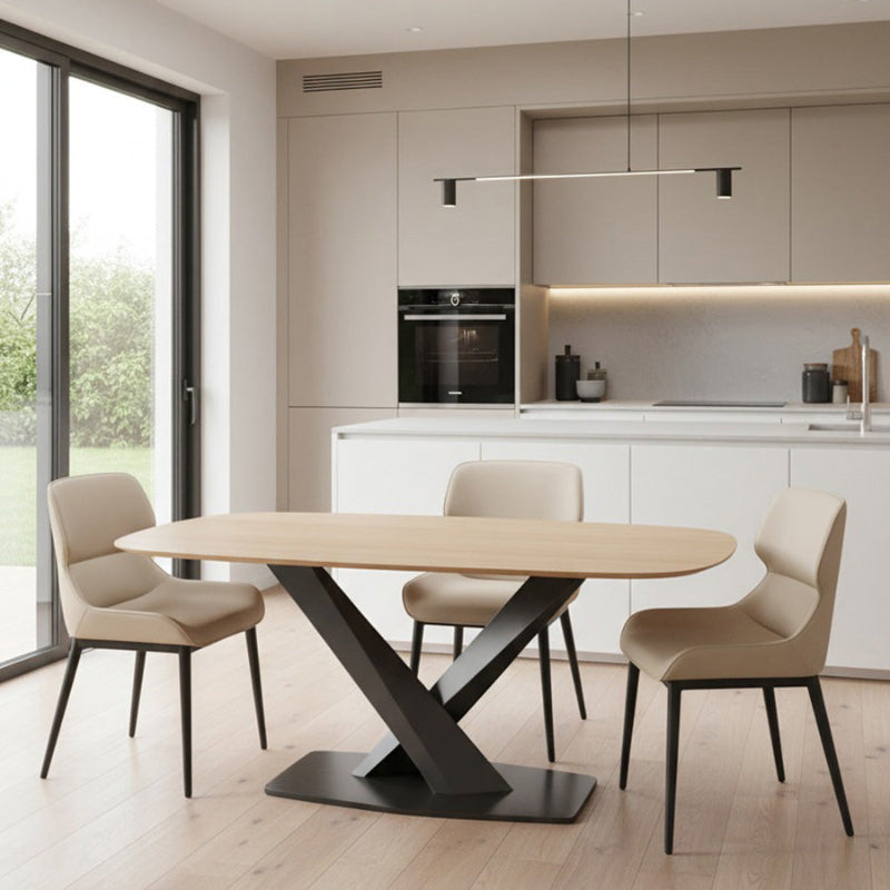 AXILON Oak Wood Grain Sintered Stone Dining Table (Curved Top) scene, styled in front of light-colored kitchen cabinets. Complemented by off-white dining chairs for a warm Nordic look.