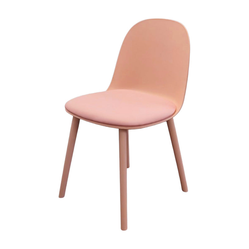 Front view of the MACARON Nordic chair with pink LGF PP plastic shell and a comfortable pink faux leather cushion.
