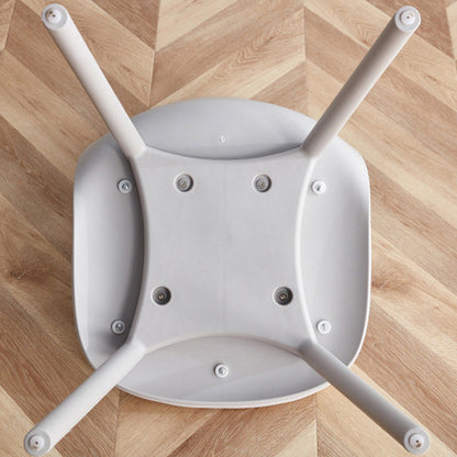 Underside view of the MACARON dining chair, showing the secure screw connections for the integrated LGF PP plastic legs and base structure.