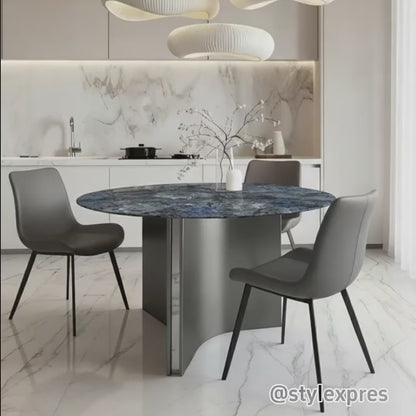 Video of Lumara 47-inch round sintered stone dining table, styled with SADE upholstered dining chairs