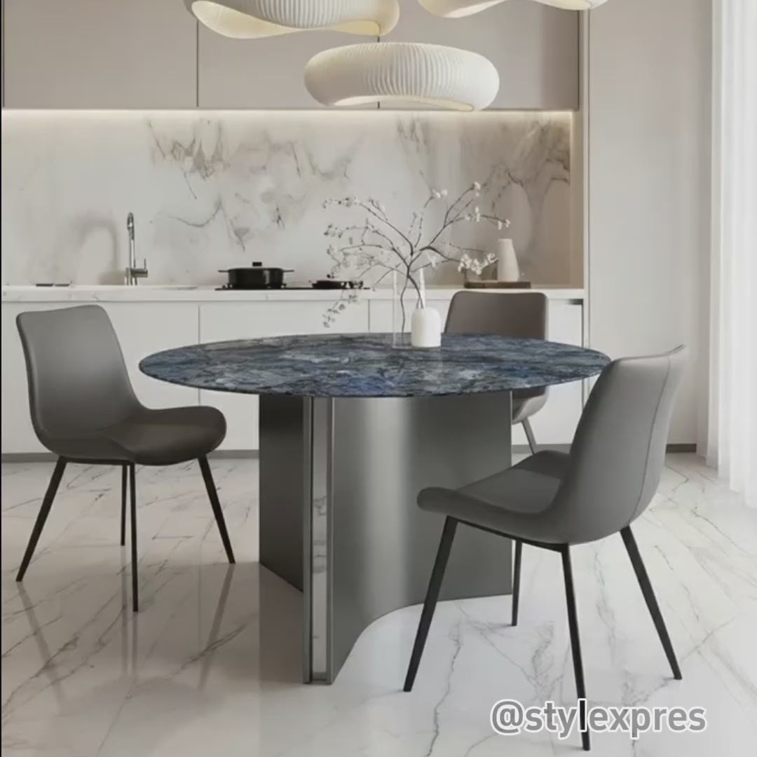 Video of Lumara 47-inch round sintered stone dining table, styled with SADE upholstered dining chairs