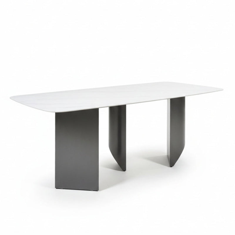 Angled view of the BVEL table, showing the 200cm/79in Sintered Stone top and the staggered, artistic steel base from an elevated perspective.