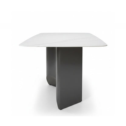 Side profile view of BVEL Sintered Stone dining table, highlighting the thin tabletop edge and the unique curved geometry of the grey steel legs.