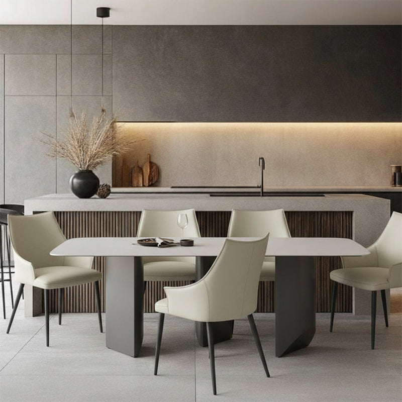 BVEL dining table shown with matching modern faux leather chairs in a full dining room setup, creating a comfortable and contemporary seating area.