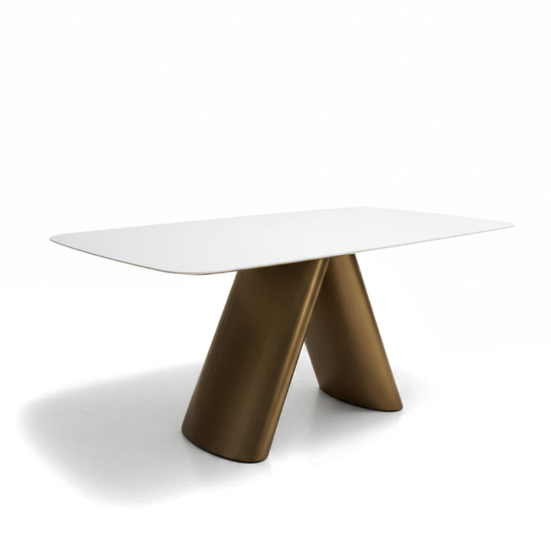 CYROLIN dining table shown in a 45-degree angled studio view, featuring a sintered stone top and bronze-look steel base.