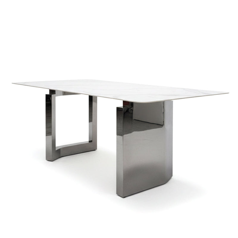 45-degree angle view of HUXI dining table showing the tabletop and base.
