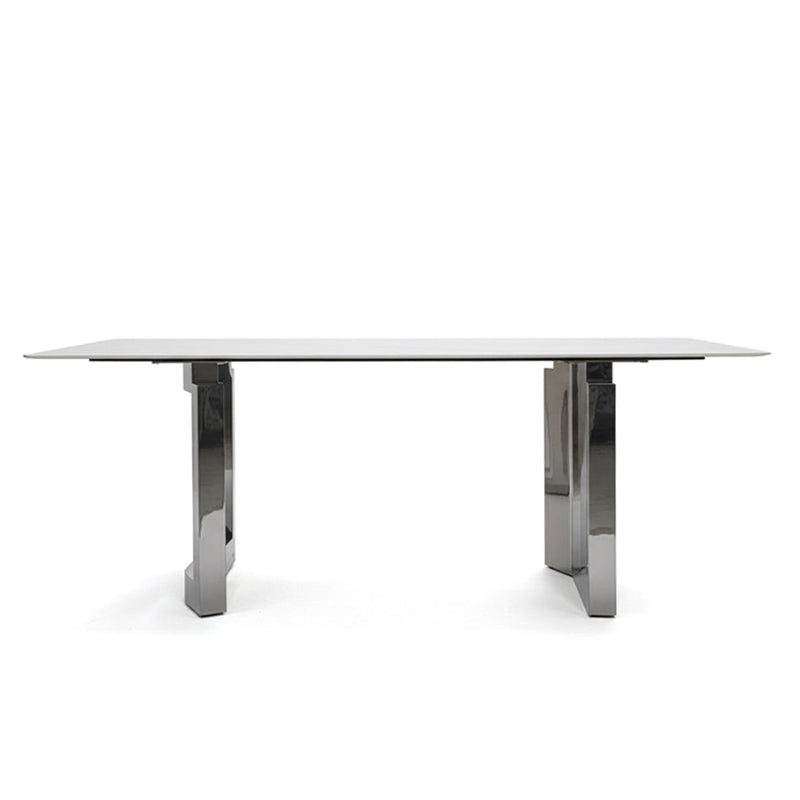 Front-facing view of HUXI dining table displaying the full structure and design.