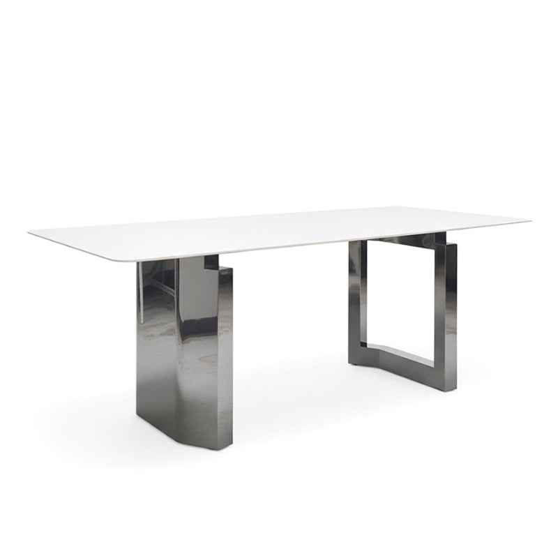 Side-angle perspective of HUXI dining table showing the proportions and chrome frame details.