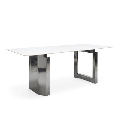Side-angle perspective of HUXI dining table showing the proportions and chrome frame details.