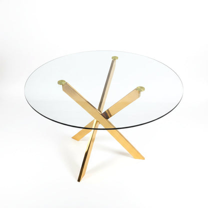 TRINITY round glass dining table featuring a 39-inch clear glass top and a gold mirror-finish stainless steel base, close-up detail view.
