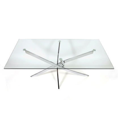 Top-down view of the VERDIS modern minimalist glass dining table with tempered glass top and mirror stainless-steel cross base
